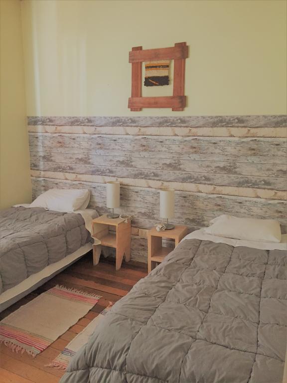 Quarto Standard com 2 Camas de Solteiro e Banheiro Compartilhado